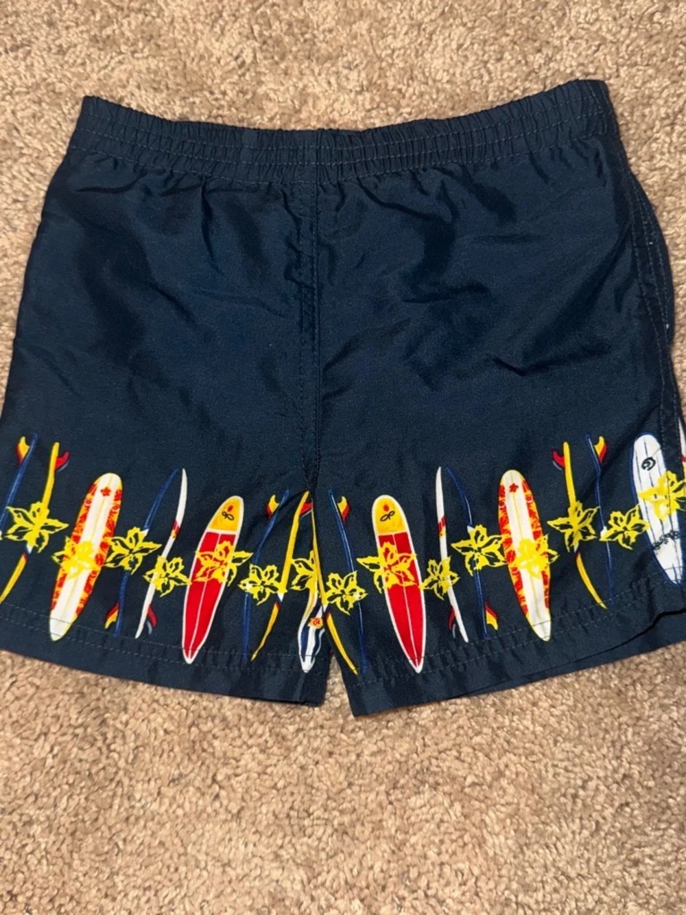 Navy Blue swim shorts with surfboards size 12m